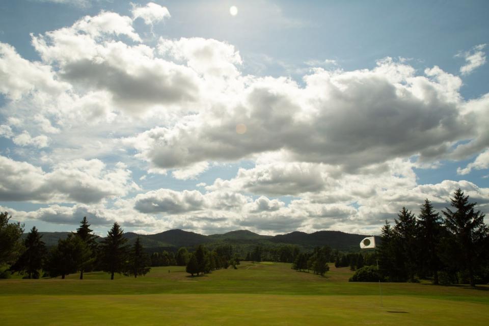 A wide view of a fairway at scenic backdrop at the Westport Country Club.