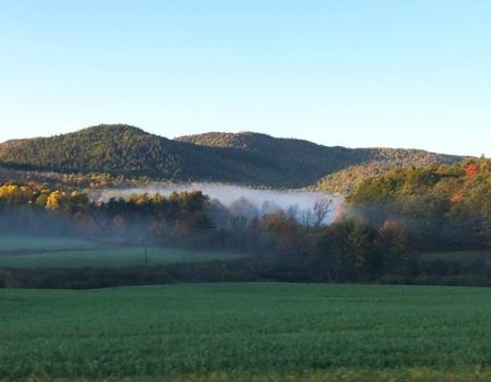 Enjoy this view of the foothills of the Adirondacks with scenic ponds.