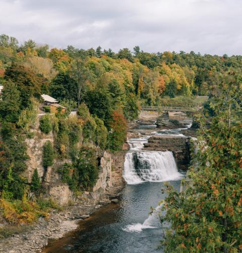 A view of the waterfall at ausable chasm in the fall.