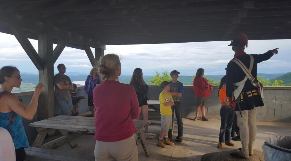 A large group of people at a pavilion