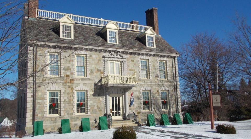 historical stone home in winter