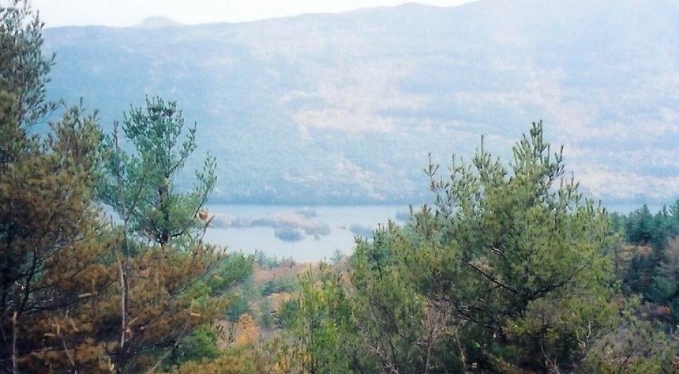 A hazy view of fall mountains in the fall