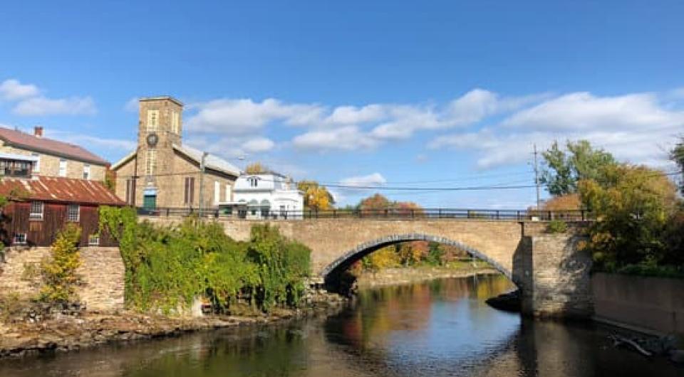 A stone bridge over a river