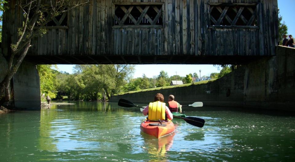 Paddling on the La Chute means historic bridges.