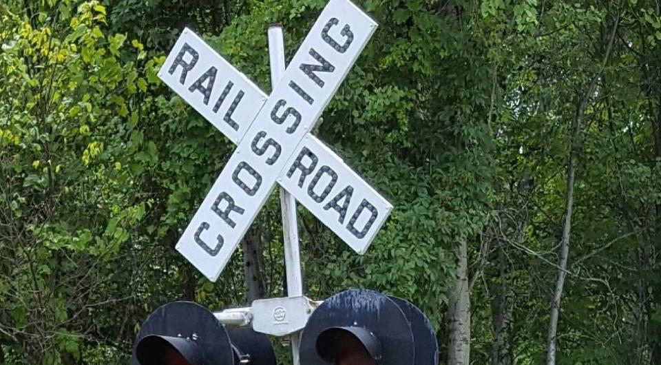 A railroad crossing sign.