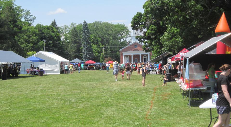 A village green with a festival happening