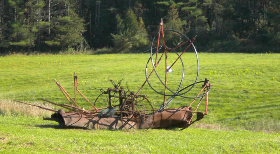 A metal sculpture on a lawn