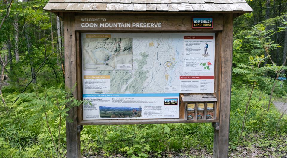 The interpretive sign for Coon Mountain Nature Preserve.