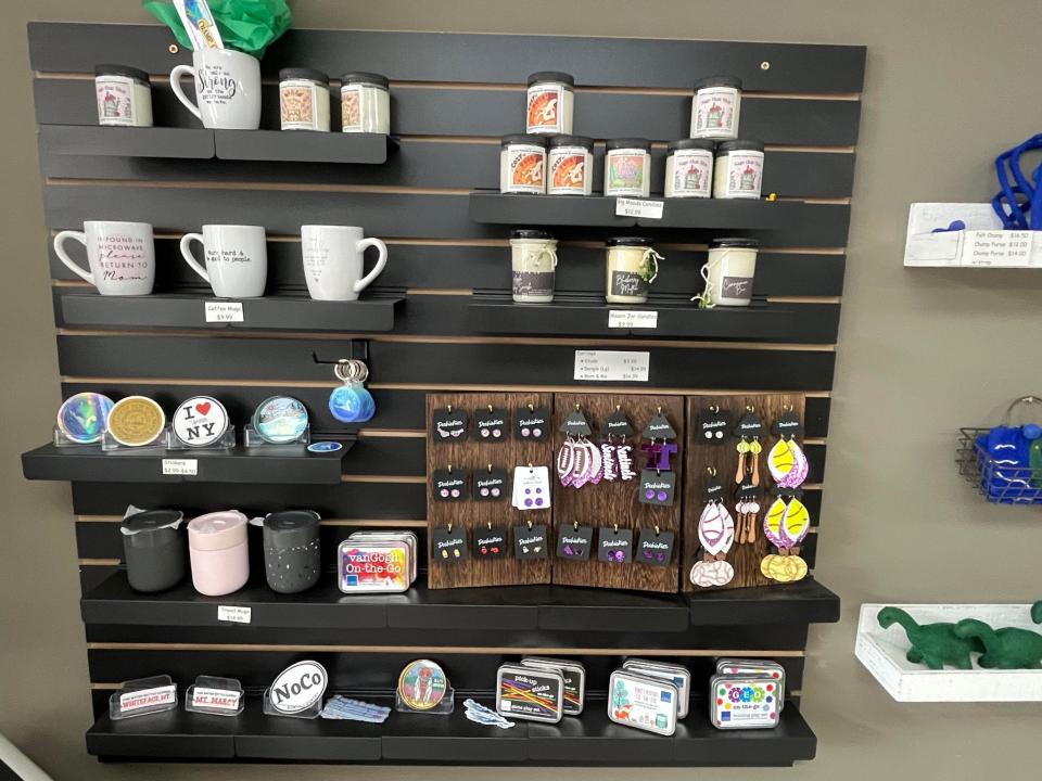 Champ Cafe merch and mugs