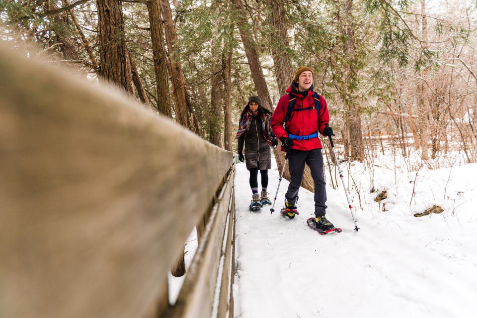 A couple snowshoeing in the Adirondacks