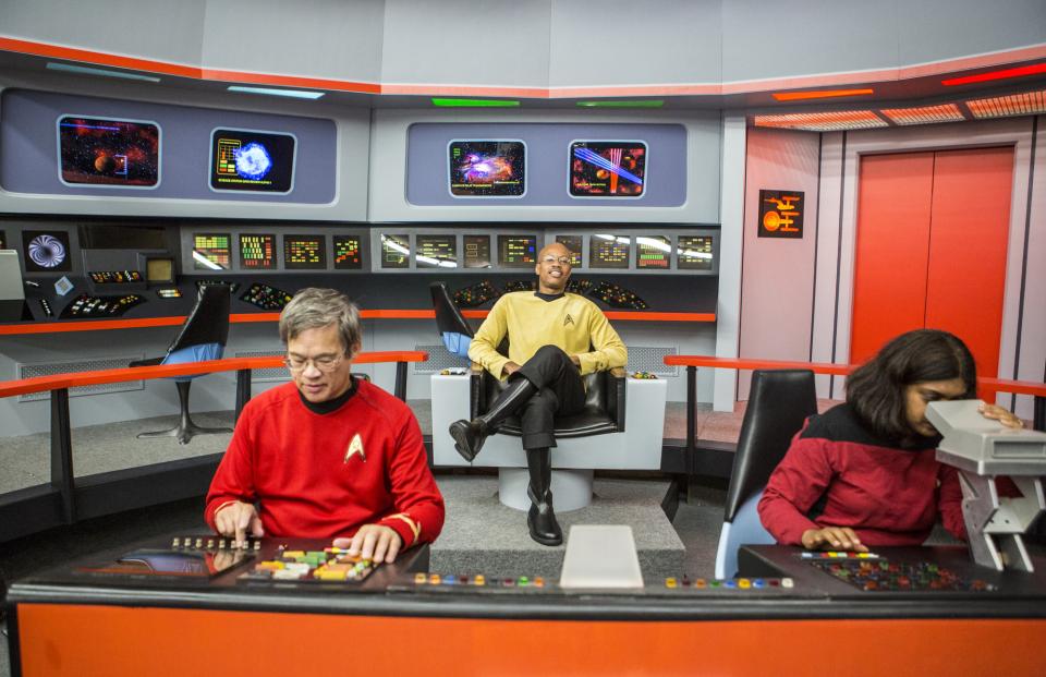 three people on set at Star Trek set tour